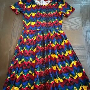 LuLaRoe Kids Dress with Red, Yellow, and Blue Pattern